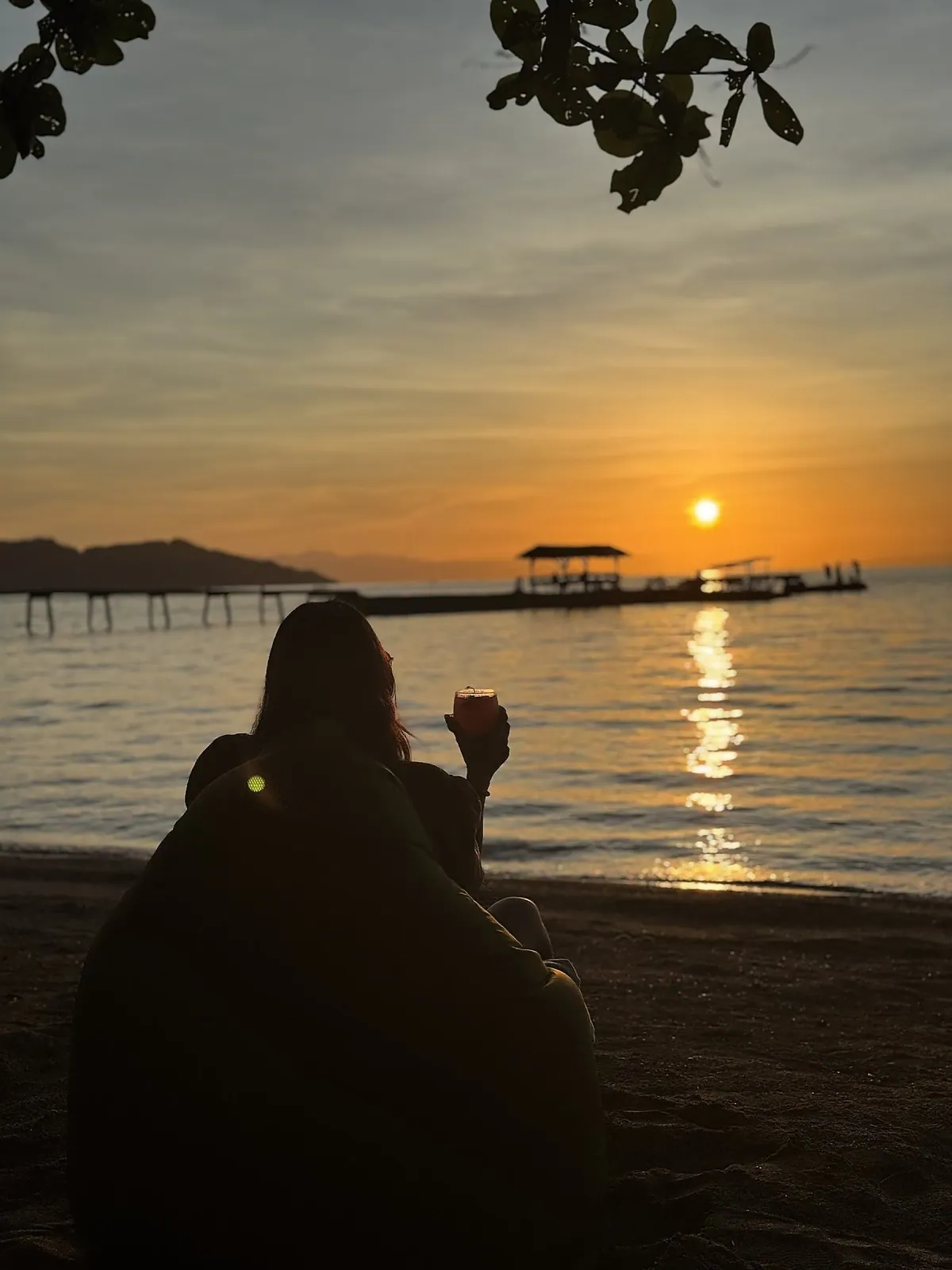 Watching the Dinagat sunset with a drink in hand from SANA's beachfront
