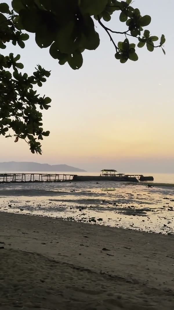 Golden hour over the Dinagat beachfront from SANA